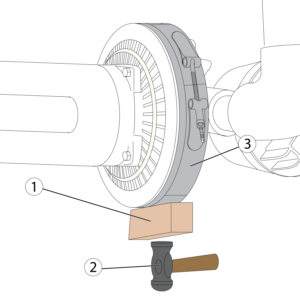 Use a block of wood and a hammer to tap the spaces out of the clamp.