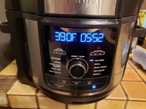 Set your air fryer to 390 degrees and cook the tater tots for 6 minutes.