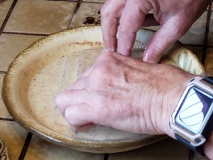 Drop the bread into the mixture so that both sides are thoroughly coated.